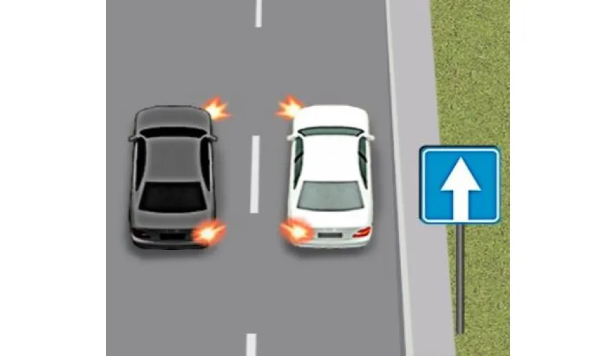 You are the driver of the white car and have decided to change lanes to the left, while the driver of the grey car has simultaneously decided to change lanes to the right. You: