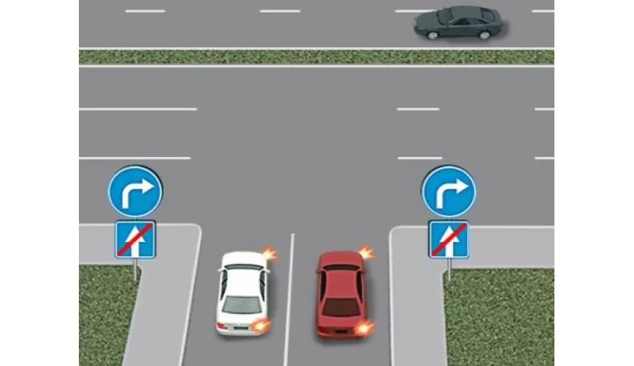 Is the driver of the white car allowed to make a right turn?