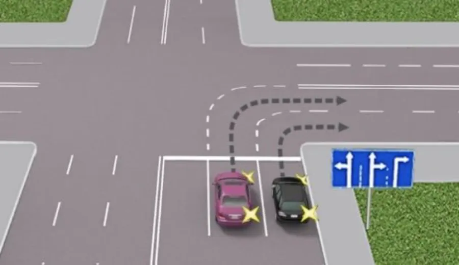 Is the vehicle on the left making a right turn into the second lane correctly?