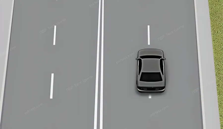 Is the driver of the vehicle moving correctly on a road that is divided into lanes by road markings?