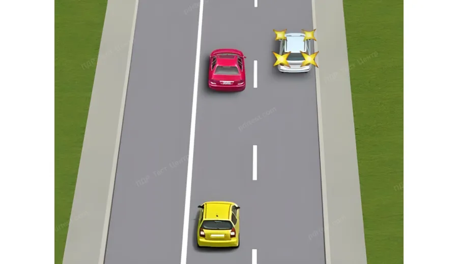 Is the driver of the yellow vehicle allowed to enter the oncoming traffic lane?