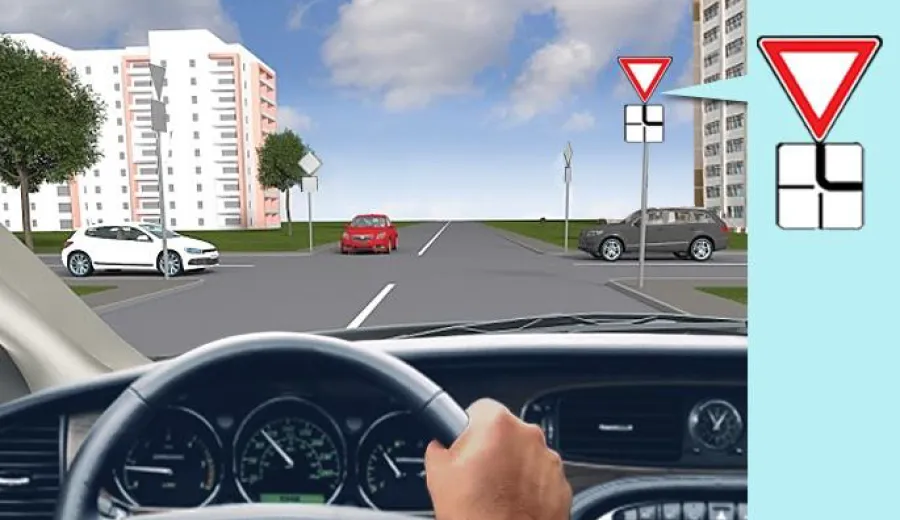 When passing this intersection, you must: