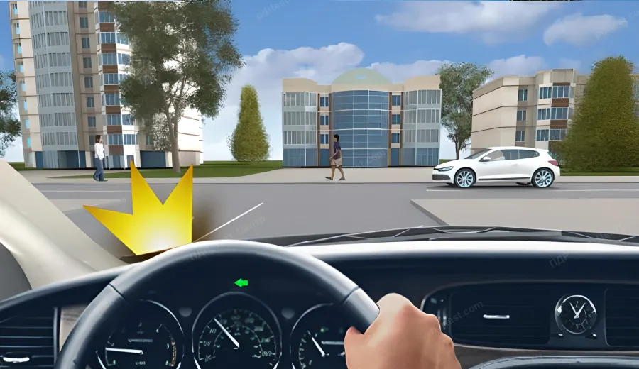 When driving through this intersection, you must: