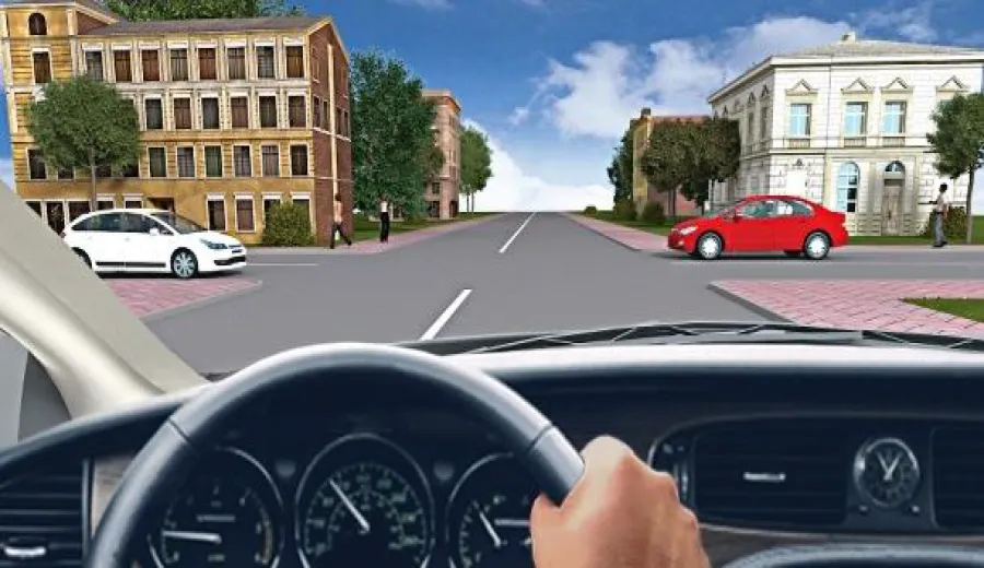 When driving through this intersection, you must: