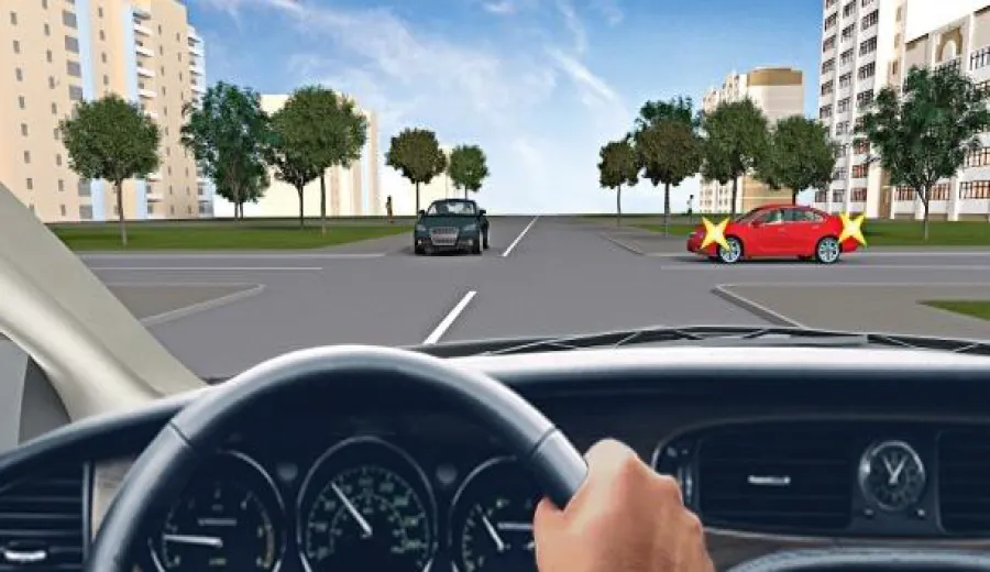 What is the order of passage of vehicles at this intersection?
