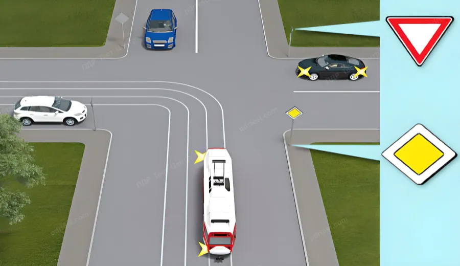 Which vehicle will pass the intersection third?