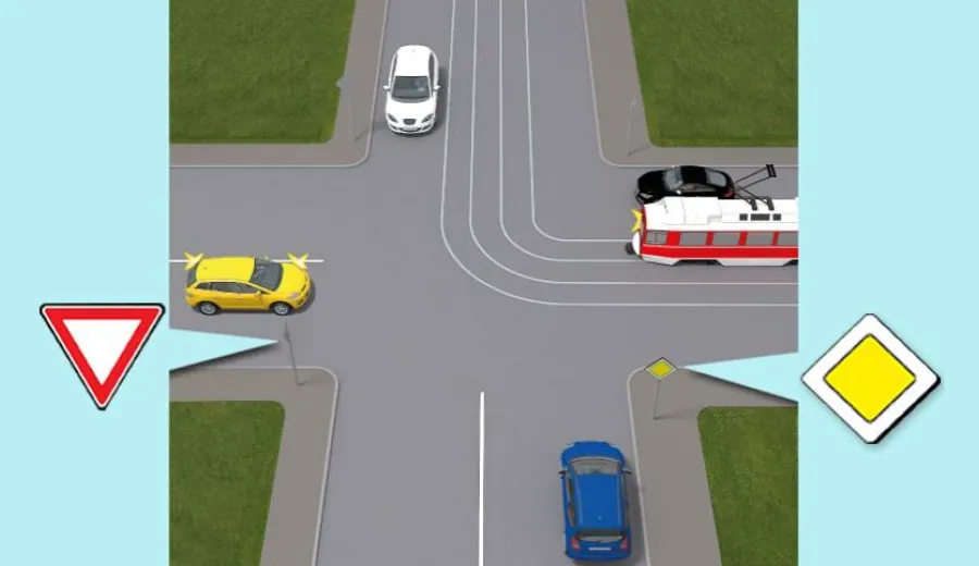 Which vehicle will pass the intersection last?