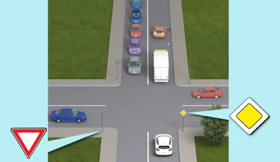 May the driver of the white vehicle enter the intersection in this situation?