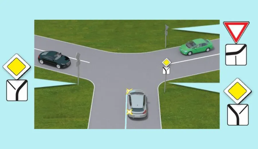 When passing this intersection, the driver of the grey car must: