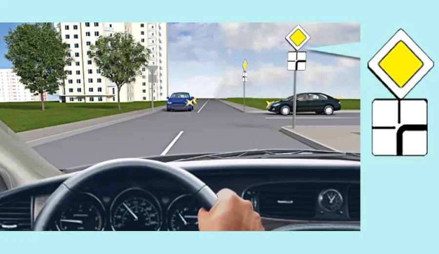 When driving straight at this intersection, you must: