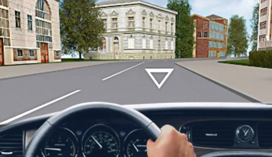 What does the road marking in the form of a triangle on the traffic lane mean?