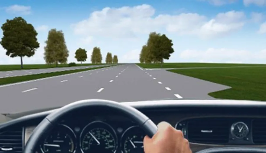 What do the broken lane markings located to the right of the driver mean?
